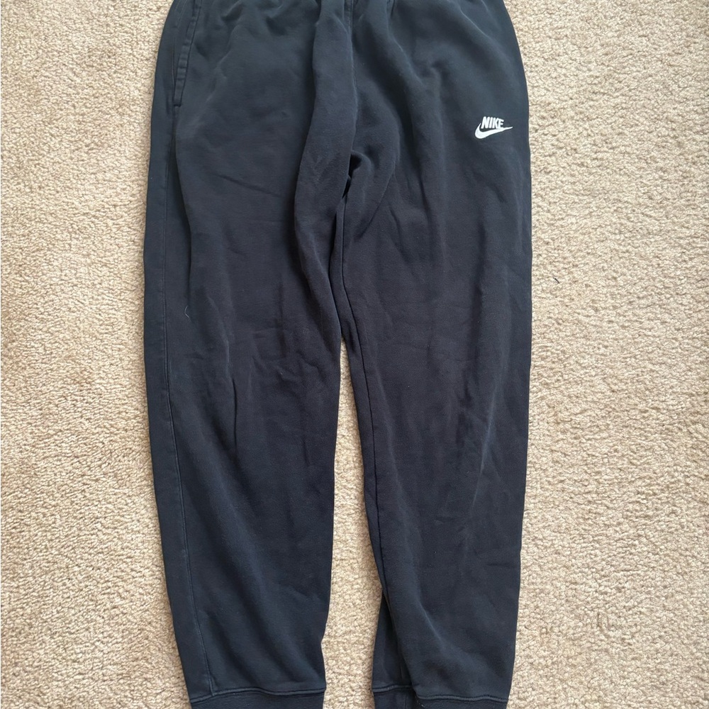 Nike Black Sweatpants with Tapered Fit and Elastic Cuffs